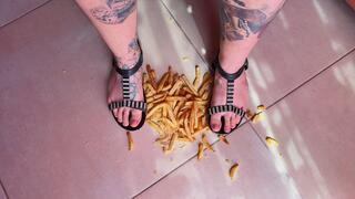 crush French fries in flat sandals
