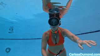 Orange suit with tank banger gag in the public pool