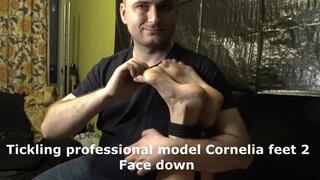 Tickling professional model Cornelia 2 face down