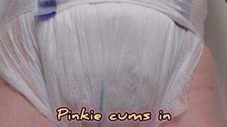 Pinkie cums in her wet diaper