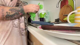 Dishwashing In Green Latex Gloves