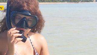 Breath play with mask in the sea
