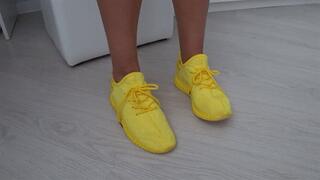 Wiggling my toes in my soft yellow sneakers aa