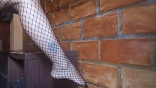 Roxan with her beautiful crossed legs and bare feet wearing fishnet stockings (3)