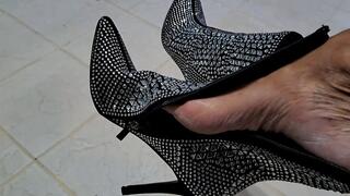 CANDI WITH THE GLITTER SHINE AND BOOTS ON THE GROUND! TOES AND SHOW DANGLING!