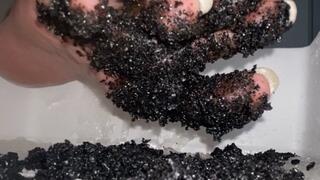 Bare toes in sticky tar