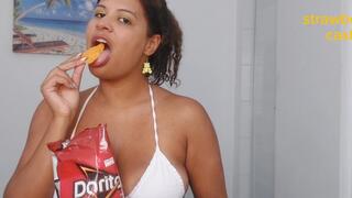 Chewing Doritos and M&Ms and burping