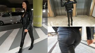 Hot brunette Jade walking outdoors in her all leather outfit