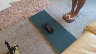 Back by popular demand GIANTESS Charn crushes a Pontiac Trans-am in Flipflops high right view