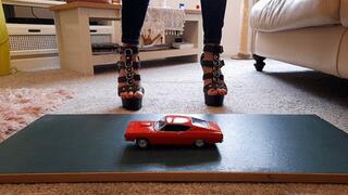 GIANTESS Charn crushes a 1969 Ford Torino in black stiletto high heels closeup ground view