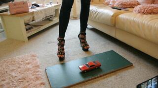 GIANTESS Charn crushes a 1969 Ford Torino in black stiletto high heels left side view