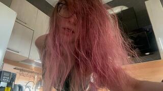 Crazy Emma and her hair play with a comb and on her face