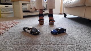 GIANTESS Charn crushes a Ford Crown Victoria police toy car & an old Toyota in chunky high heels closeup ground view