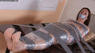 Sexy Samantha Ryan Is Wrapped in Plastic And Swaths Of Silver Duct Tape!