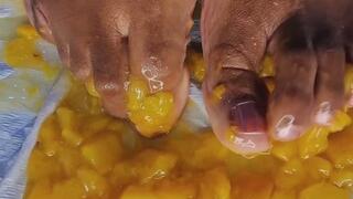 Tinas Flat Feet - Peaches Smash - A close up sensory-rich video of feet smashing ripe peaches, creating visually engaging blend of textures and sounds