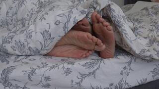 Flirting with legs under the blanket Ea