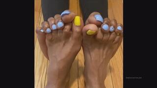 Ebony Toes Get Into a Footsie Fight