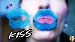 Goth girl kisses with big blue naughty lips
