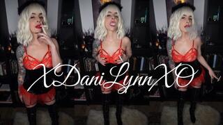 Smoking Wearing Red Lingerie and Boots
