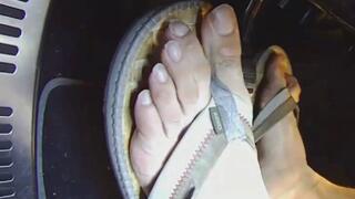 Driving hard in flip flops side view