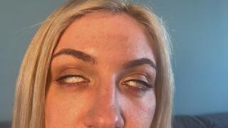 Sexy blonde rolling eyes