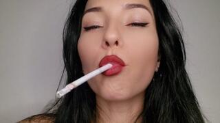 Chainsmoking Vogue cigarettes hands free: Miss Sara