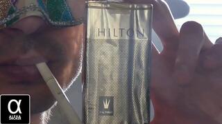 Smoking Hilton 100s closeup SLOW