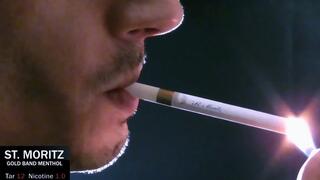 Smoking St Moritz menthol Super closeup SLOW