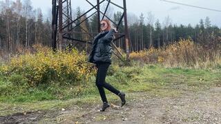 the girl in high heels loves to jump and run in the mud, she gets special pleasure from the way the mud covers her feet