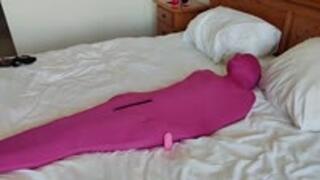 Gagged hotel maid struggling in bondage sack