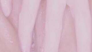 Moaning Japanese MILF fingerfucks herself