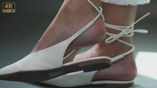 Elegant sandals, candid foot and shoe fetish pose under watch, sexy feet movement