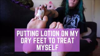 Putting lotion on my dry feet to treat myself