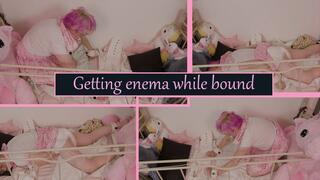 Getting enema and messing my diaper while bound to my crib