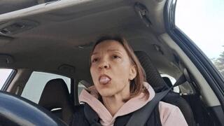 Car driving blowing bubbles and crack chewing gum