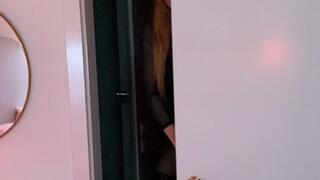 Catwoman is licking her banana