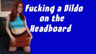 Fucking a Dildo on the Headboard