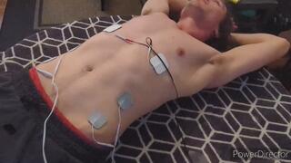 Bound muscle twink with electropads and nipple clamps cranked up high