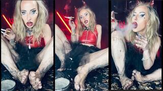 Devil queen chain smokes 2 black devil and 2 Marlboro 100 at once