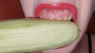 chewing and eating a cucumber