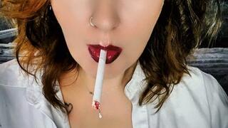 Enjoy the seductive contrast between the rich darkness of my lipstick and the stark white of the cigarette