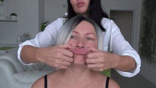 giving her BIG fish lips and pinching her stretchy face