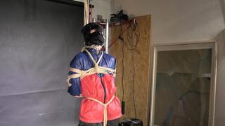 Aiyana bound, Pantygagged and Pantyhooded in shiny nylon Rainwear