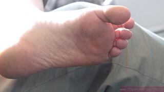 Dirty barefeet on seat, nice bare soles close-up