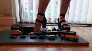 Giantess Lou crushes buildings, cars, trucks & train coaches in big black chunky heels ground view