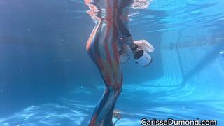 Carissa in her new pool using the underwater scooter