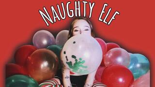 Naughty Elf doing what she's not supposed to do
