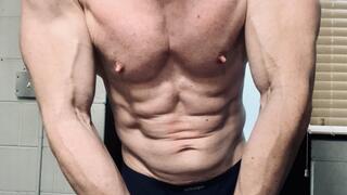 Up close muscle flexing with ab punches and nipple play SD