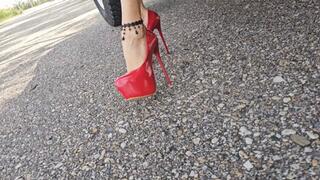 Katherine driving a classic Toyota Land Cruiser 1977 on sexy red platform heels