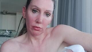 Stevie sneezes on her feet as she scrunches them and removes her socks